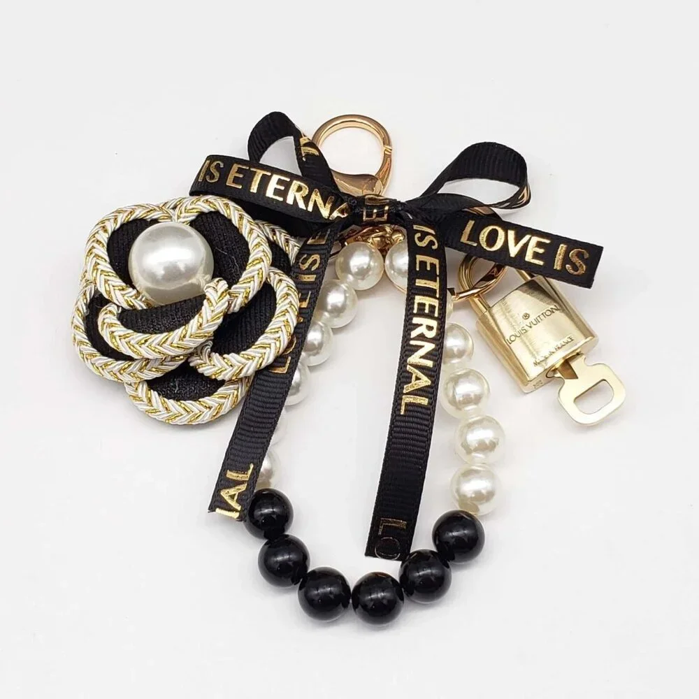 Authentic Louis Vuitton Lock & Key with unbranded flower Bagcharm, Keycharm
